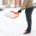 winter-cleaning-concept-closeup-man-shoveling-snow-from-driveway kopia.jpg